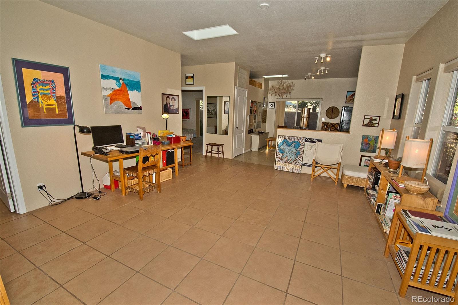 109 Pinewood Overlook Crestone, CO 81131 - Photo 6 of 35 a living room with furniture and a flat screen tv