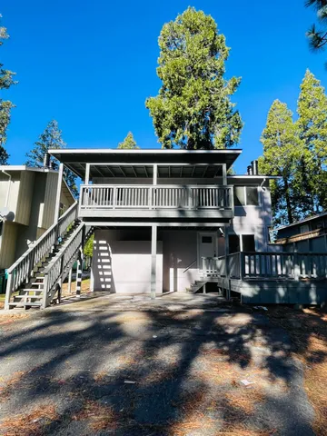 a front view of a house with street