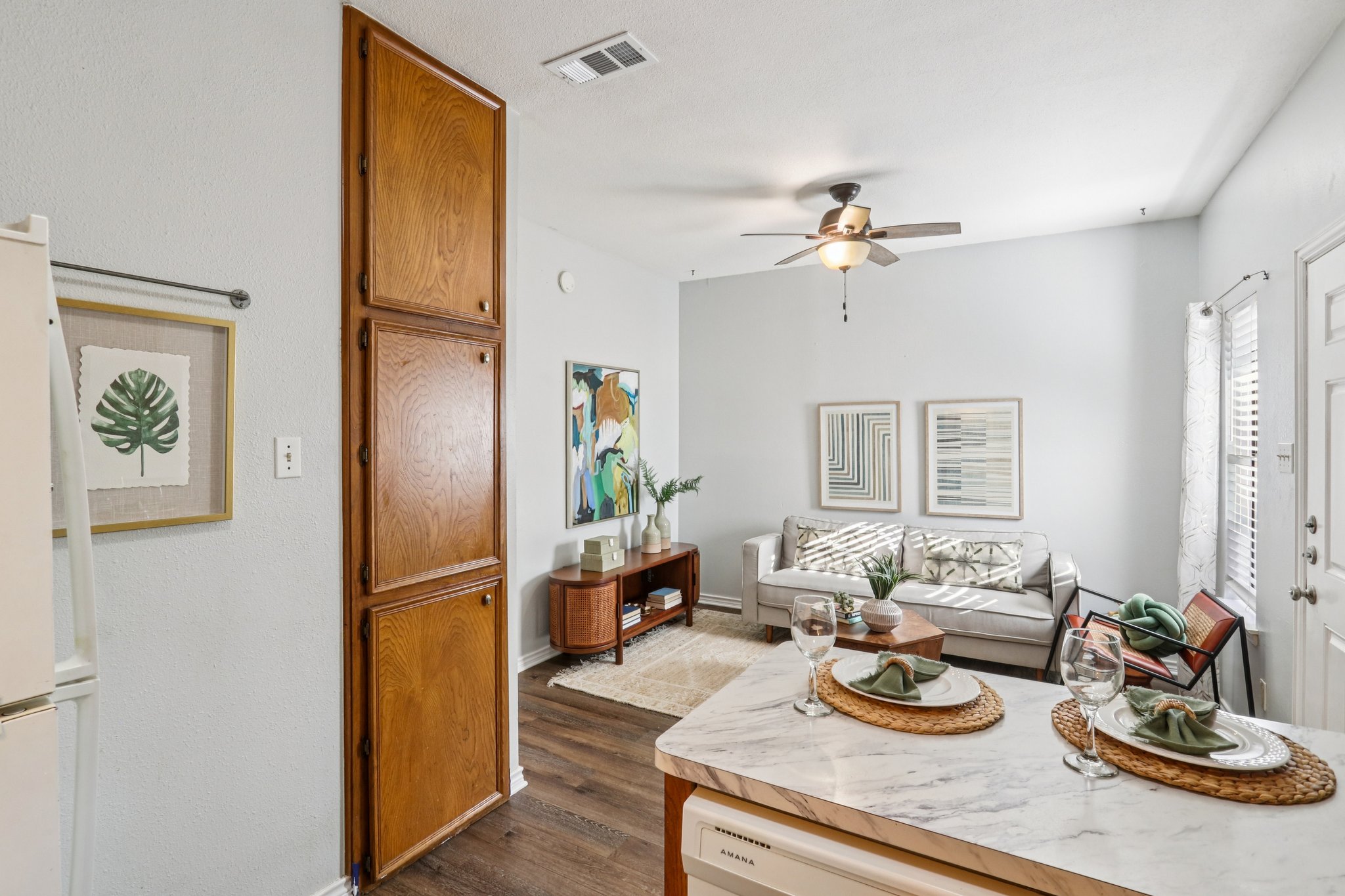 4401 Speedway, Unit 105 Austin, TX 78751 - Photo 20 of 38 a view of a dining room with furniture a chandelier and wooden floor