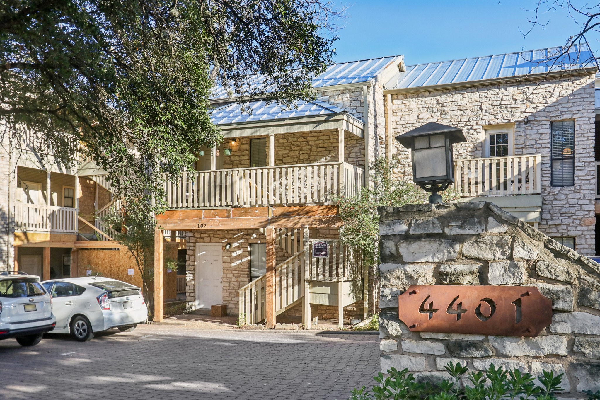 4401 Speedway, Unit 105 Austin, TX 78751 - Photo 2 of 38 a front view of a house with garden