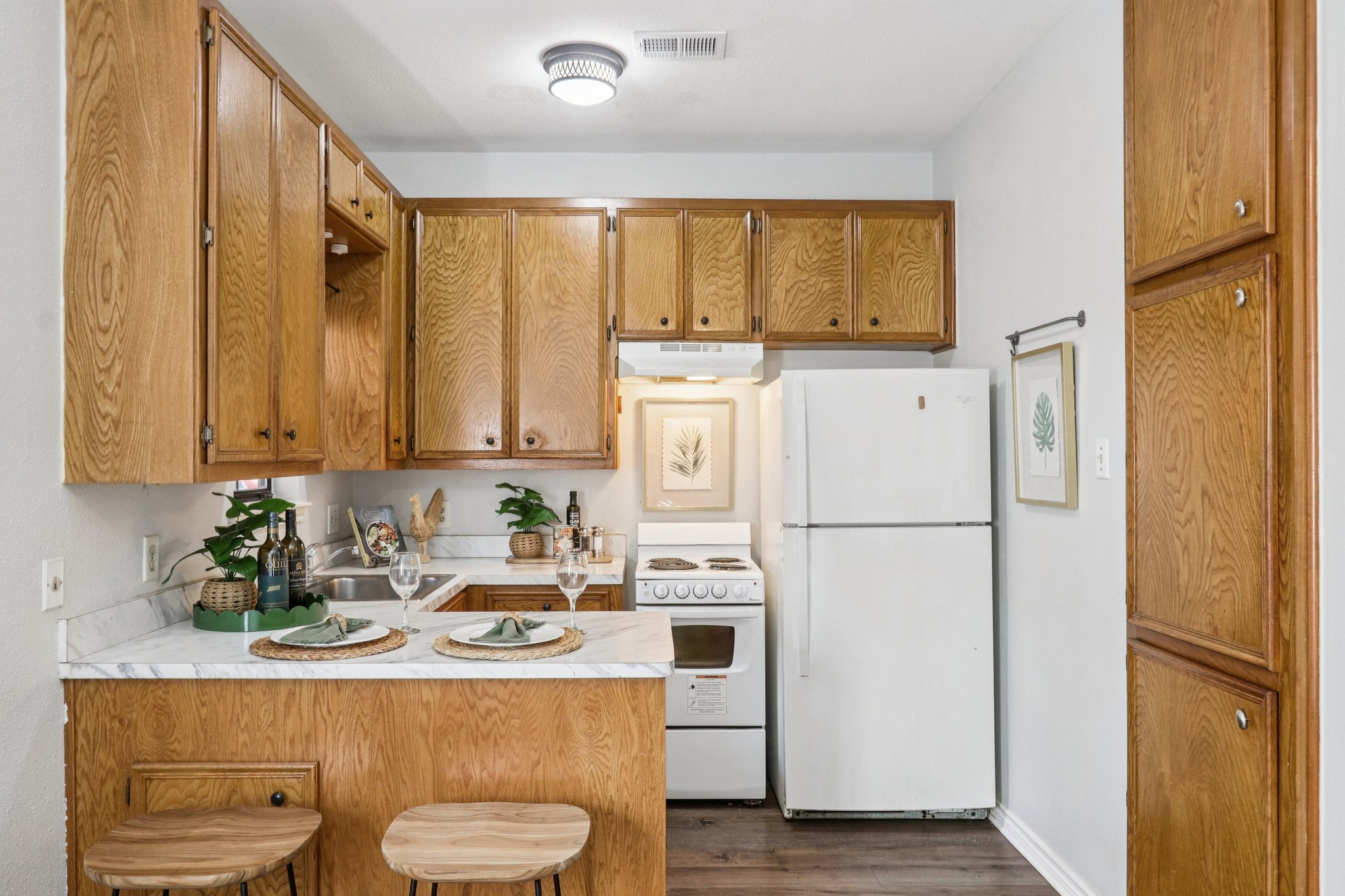 4401 Speedway, Unit 105 Austin, TX 78751 - Photo 22 of 38 a kitchen with stainless steel appliances a refrigerator sink and cabinets