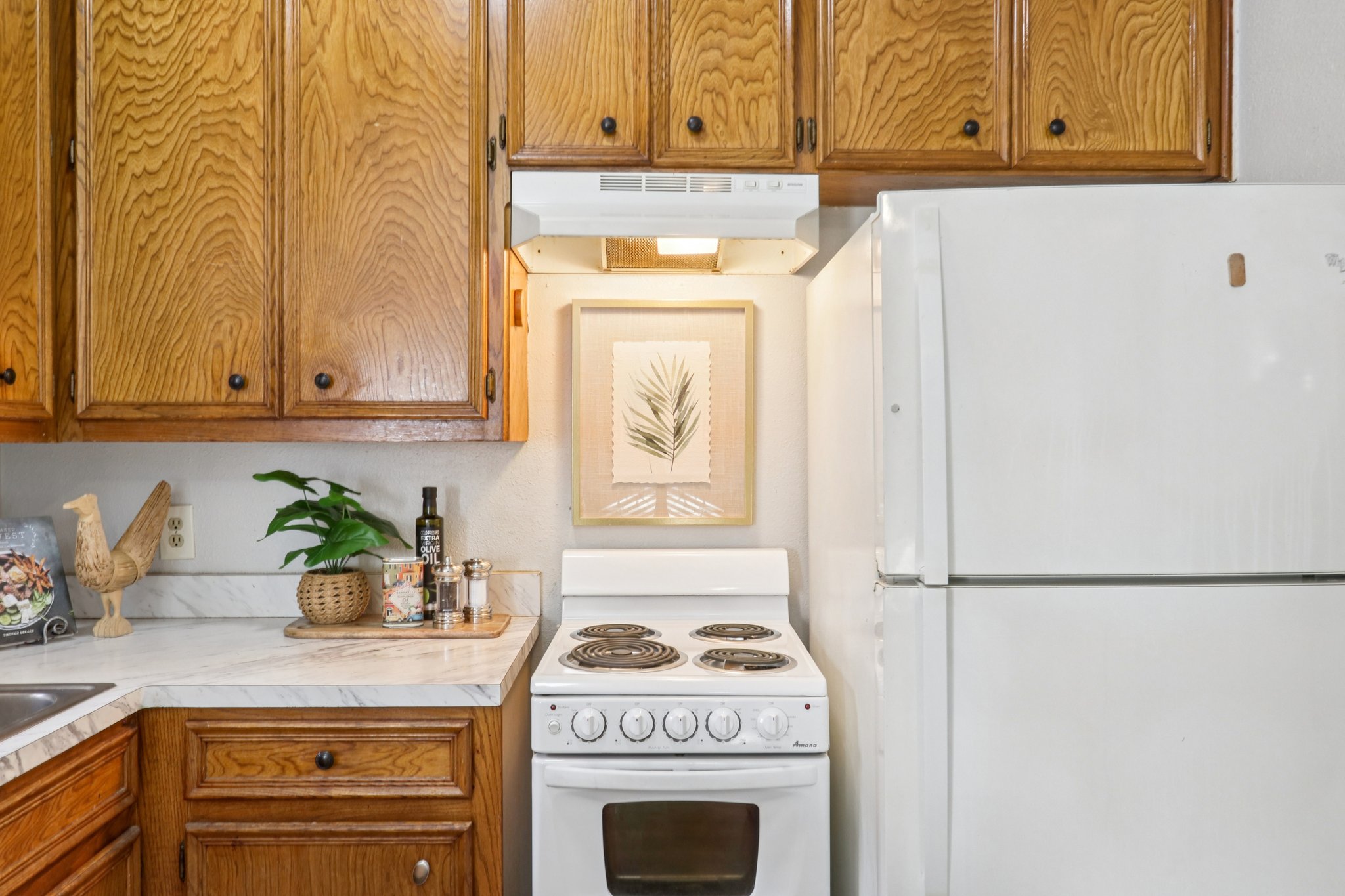 4401 Speedway, Unit 105 Austin, TX 78751 - Photo 24 of 38 a kitchen with stainless steel appliances granite countertop a sink a stove and a refrigerator