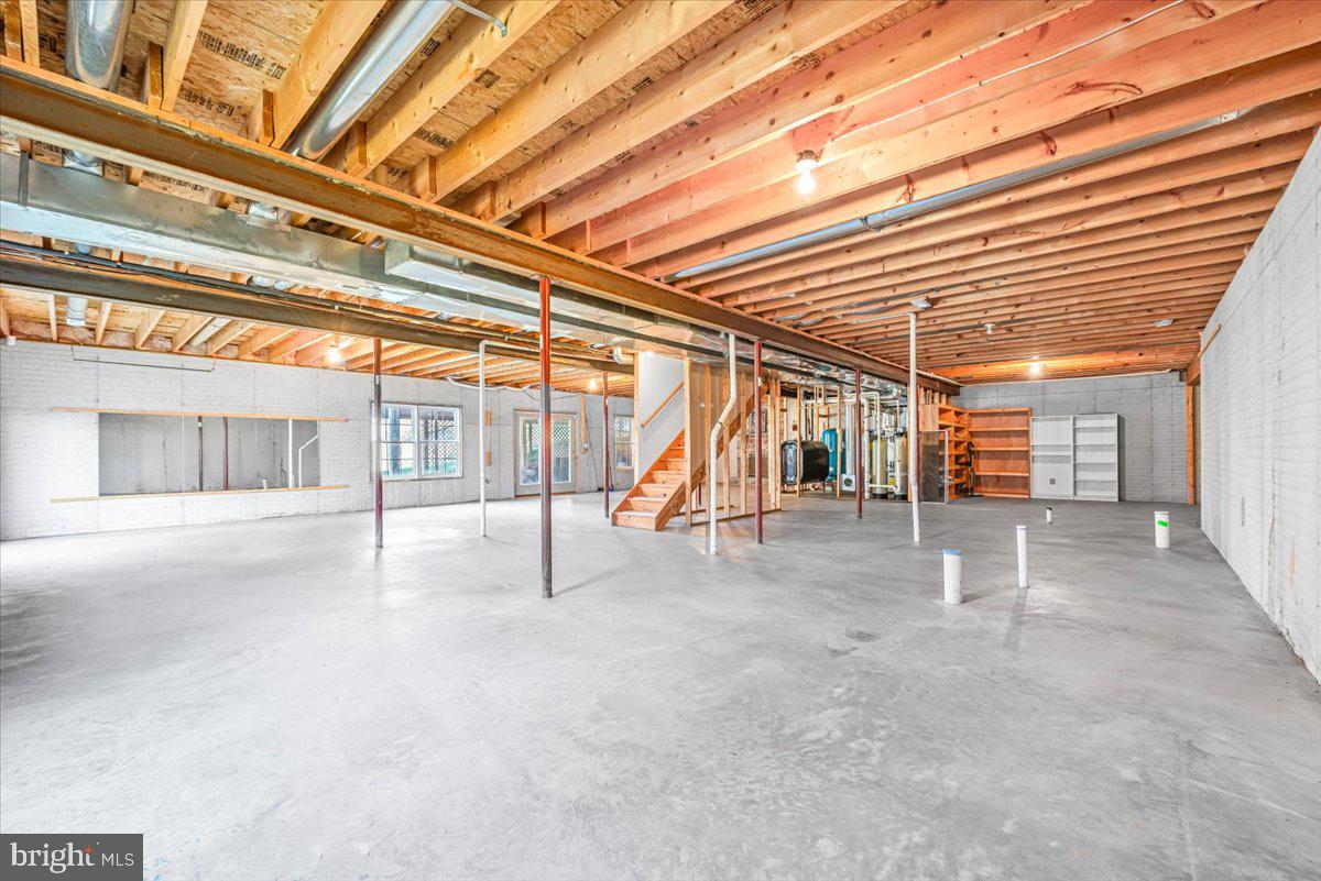 19626 Garretts Mill Road Knoxville, MD 21758 - Photo 30 of 38 a view of an empty room with wooden floor