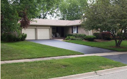 102 Stonegate Road Buffalo Grove, IL 60089 - Photo 1 of 1 a front view of a house with a garden and yard