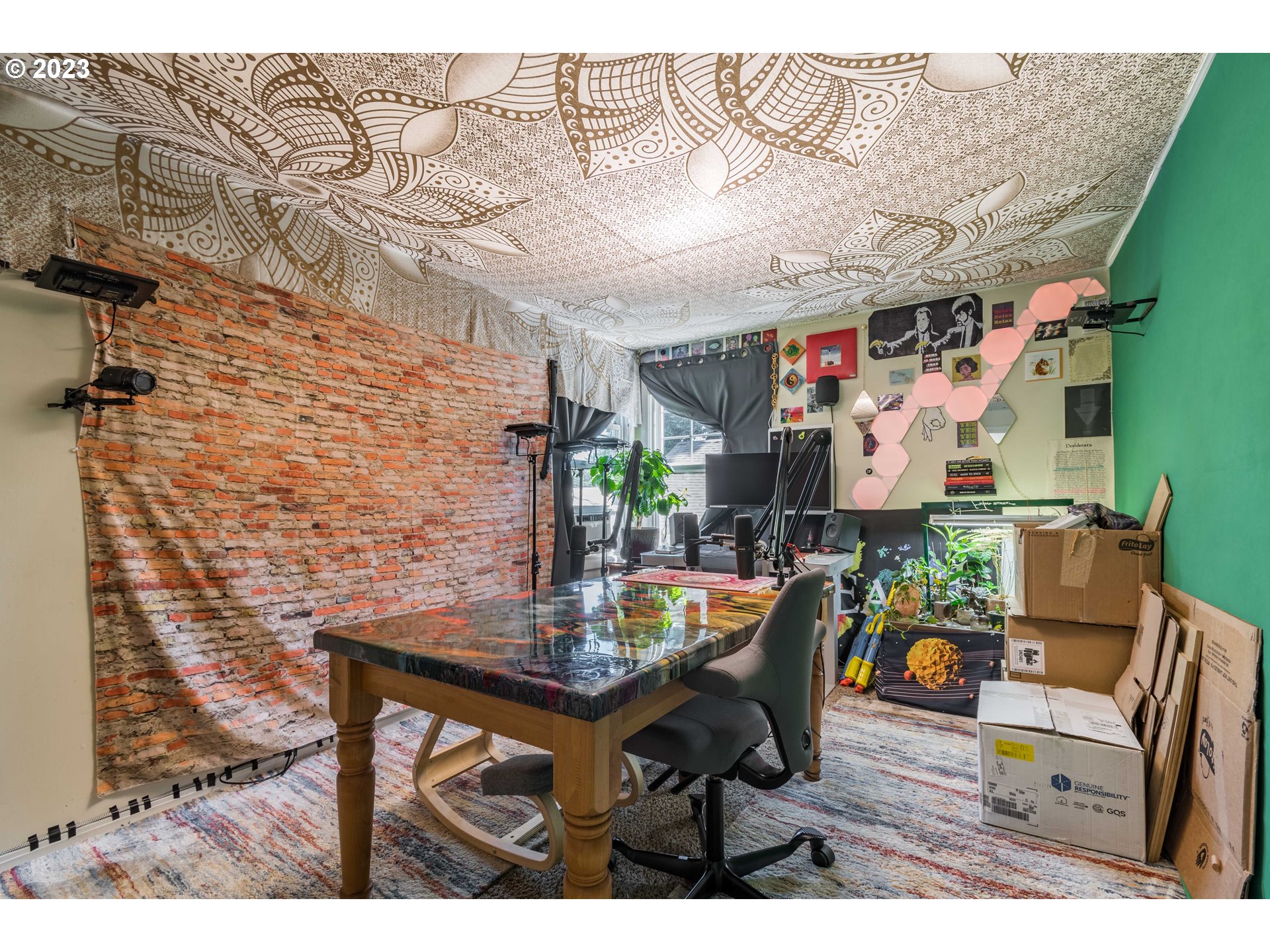 1275 West 5th Avenue Eugene, OR 97402 - Photo 30 of 31 a view of a dining room with furniture and a chandelier