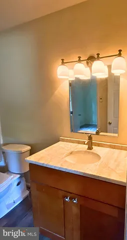 a bathroom with a sink and a toilet
