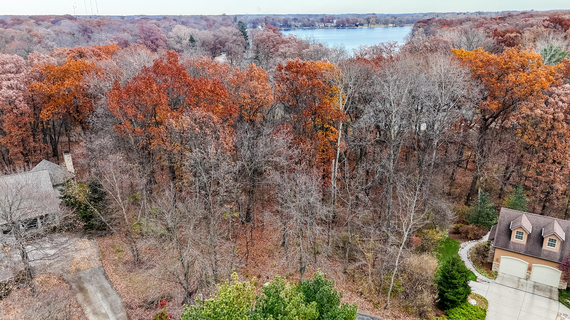 5101 Garden Gateway Road Valparaiso, IN 46383 - Photo 7 of 12 a view of a forest with houses