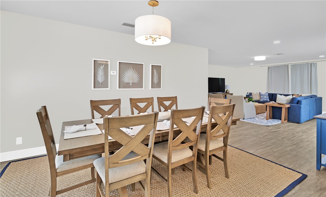 7989 143rd Street Sebastian, FL 32958 - Photo 6 of 30 a view of a dining room with furniture