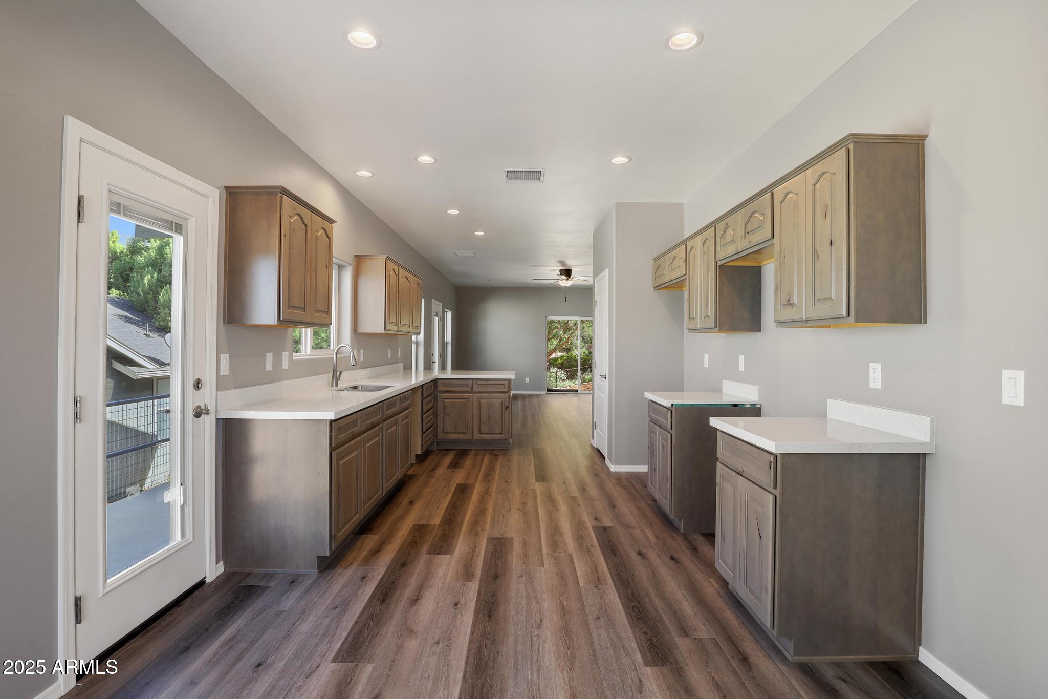 1019 South Ponderosa Street Payson, AZ 85541 - Photo 7 of 34 a large kitchen with a lot of counter space