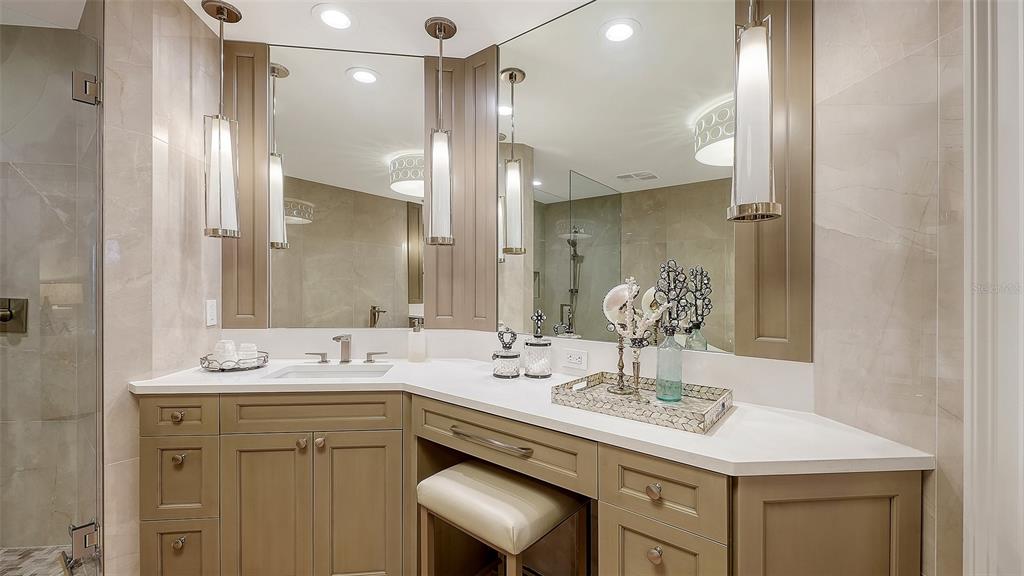 6465 Water Crest Way, Unit 301 Lakewood Ranch, FL 34202 - Photo 33 of 85 a bathroom with a sink double vanity and a mirror