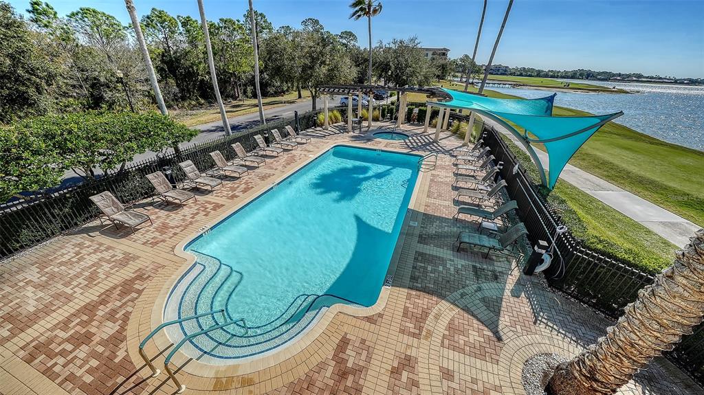 6465 Water Crest Way, Unit 301 Lakewood Ranch, FL 34202 - Photo 64 of 85 a view of a swimming pool with a patio