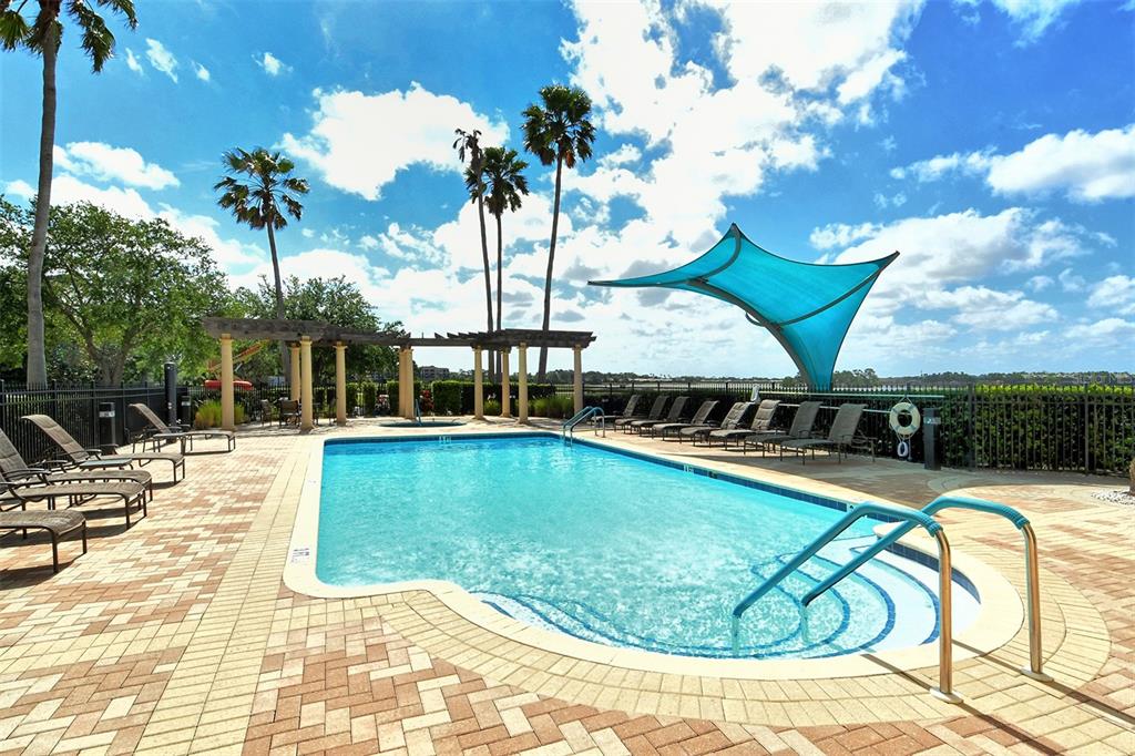 6465 Water Crest Way, Unit 301 Lakewood Ranch, FL 34202 - Photo 67 of 85 a view of swimming pool with seating space