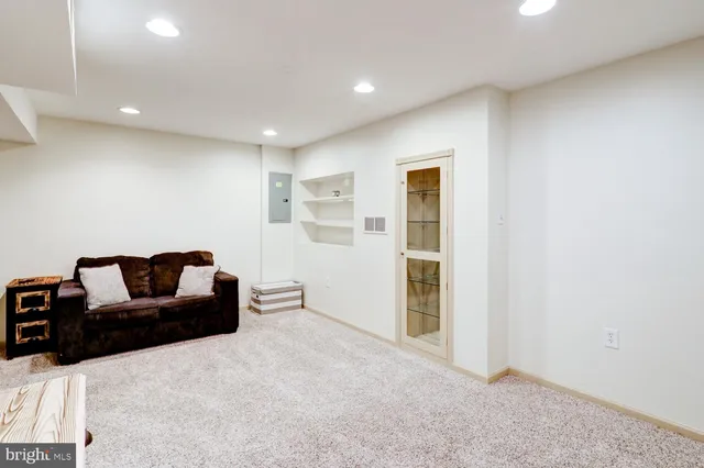 a kitchen with a sink cabinets and appliances