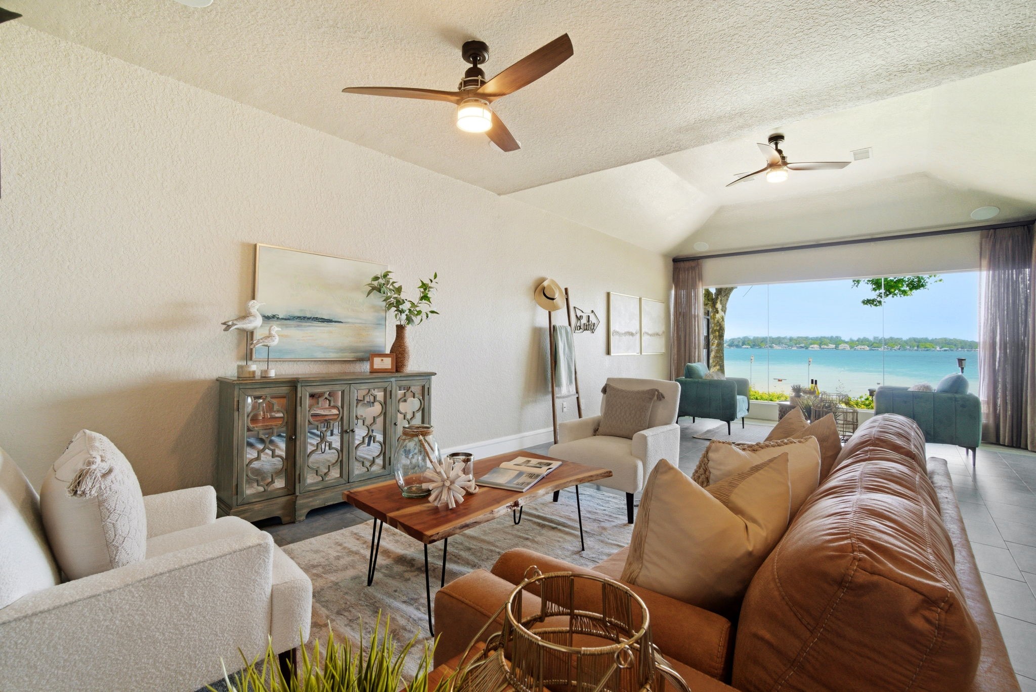1609 Schooner Point Willis, TX 77318 - Photo 14 of 50 a living room with furniture kitchen view and a large window