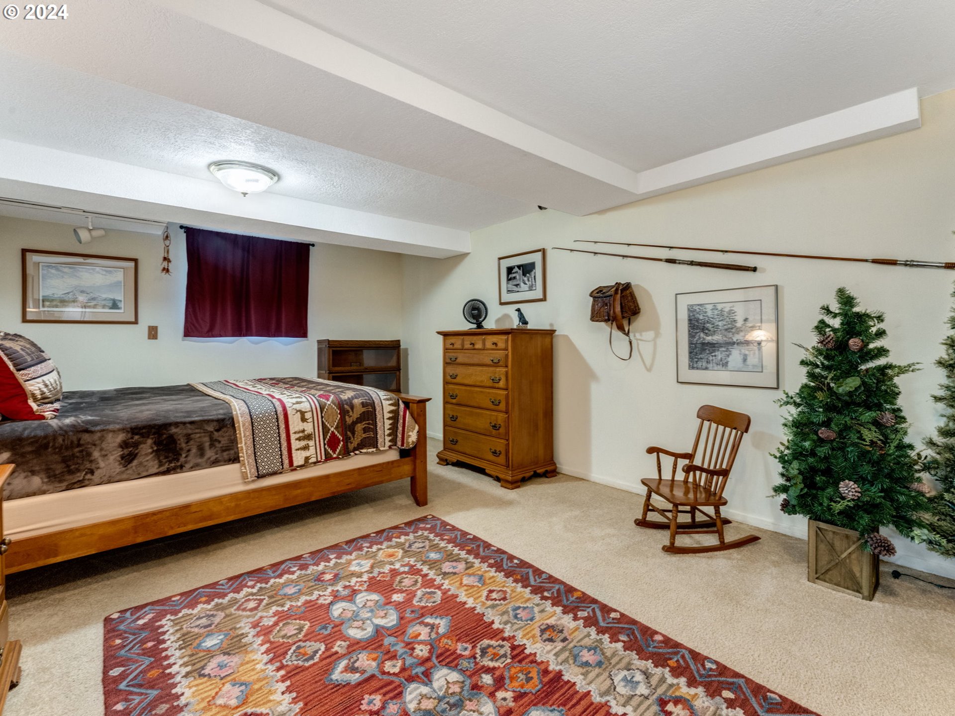 4144 Southeast Ogden Street Portland, OR 97202 - Photo 15 of 27 a bedroom with furniture and a couch