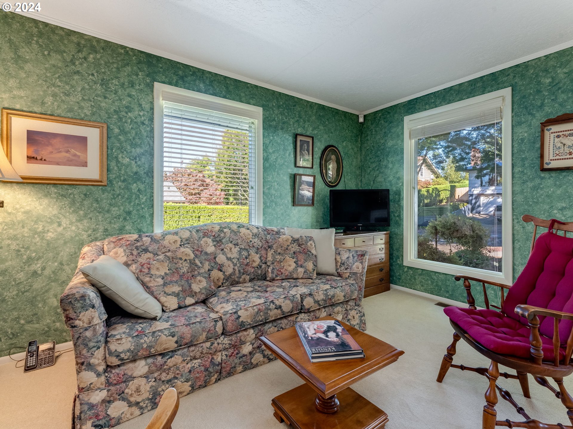 4144 Southeast Ogden Street Portland, OR 97202 - Photo 3 of 27 a living room with furniture a flat screen tv and a large window