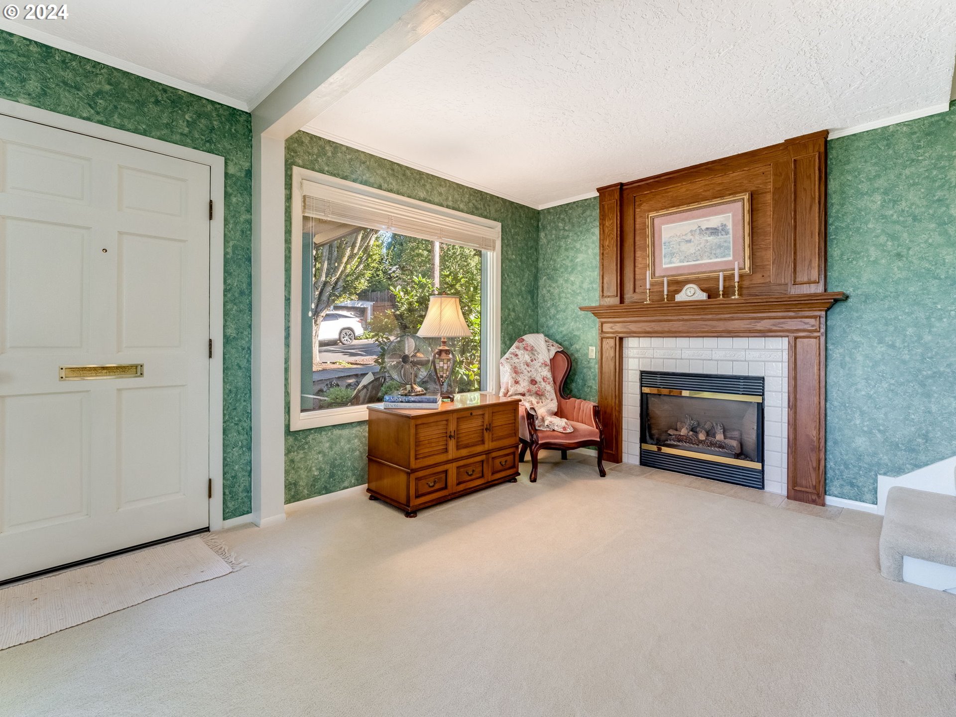 4144 Southeast Ogden Street Portland, OR 97202 - Photo 4 of 27 a living room with furniture and a fireplace