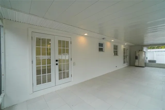 a bathroom with a bathtub and shower