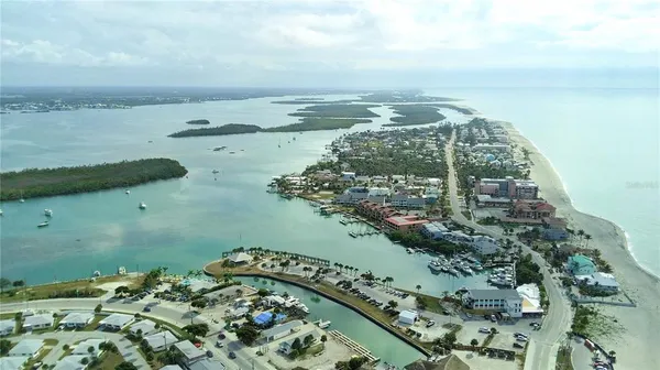 a view of a park with swings and slides