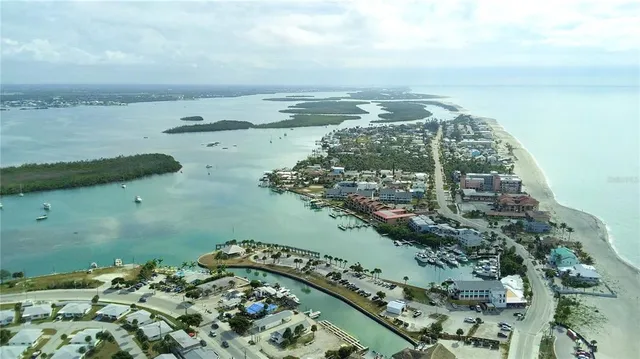 a view of a park with swings and slides