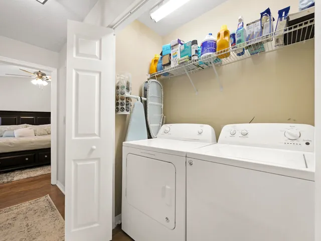 a view of a balcony with chair and table