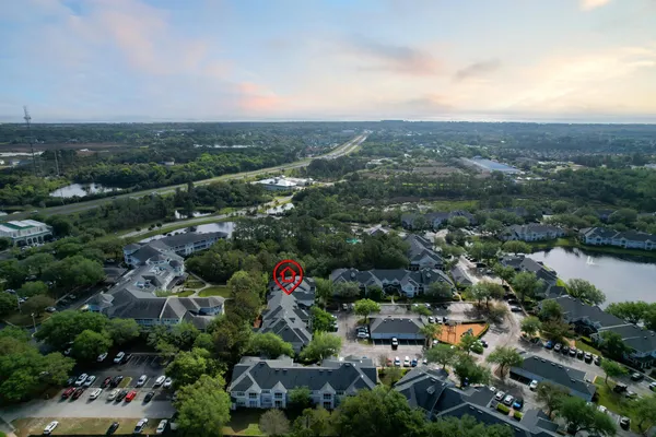 an aerial view of city and lake view