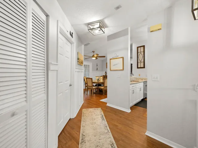 a kitchen with a sink stove and refrigerator