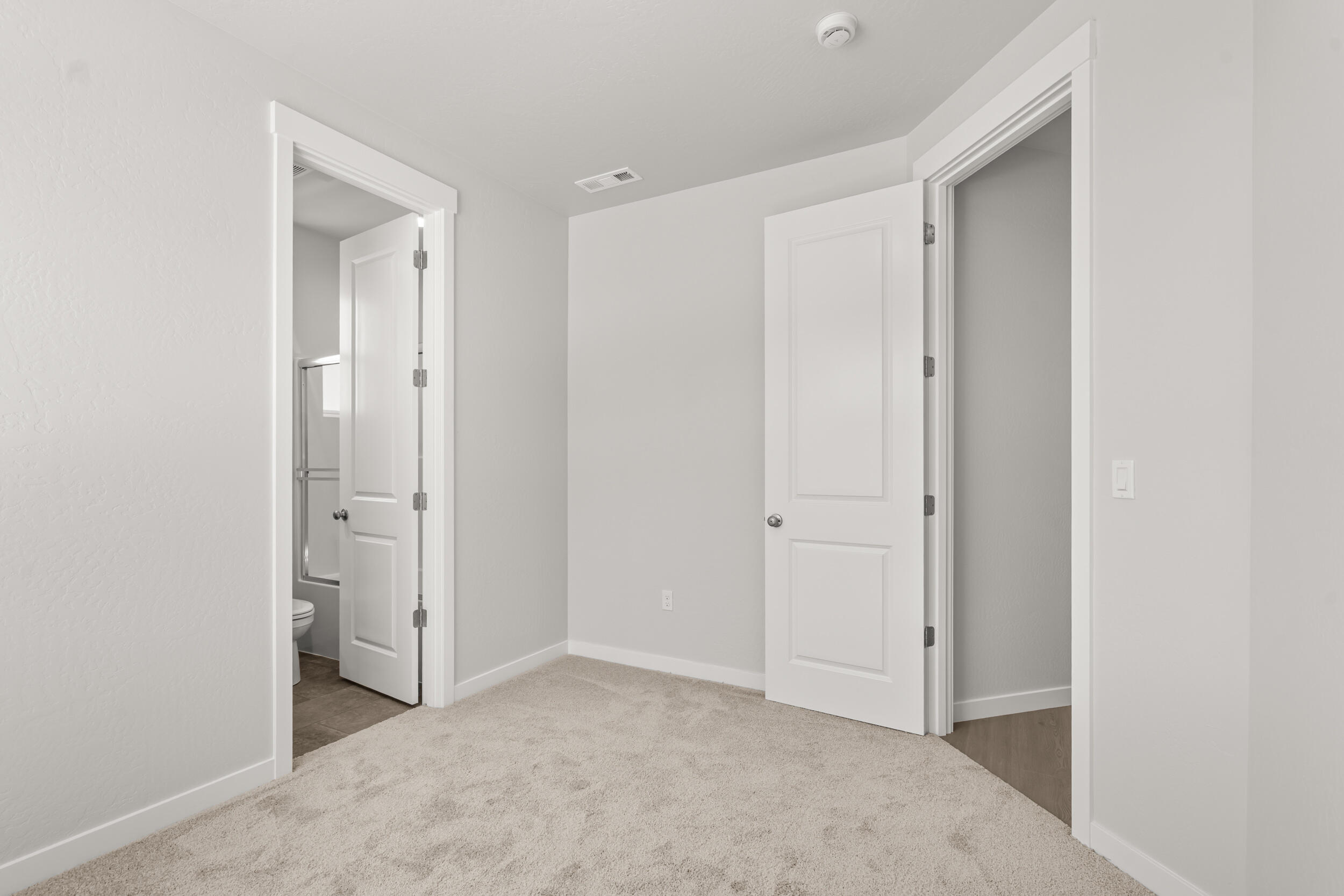 1141 Pumpkin Ridge, Unit 320 Eagle Point, OR 97524 - Photo 17 of 25 a view of an empty room with closet area