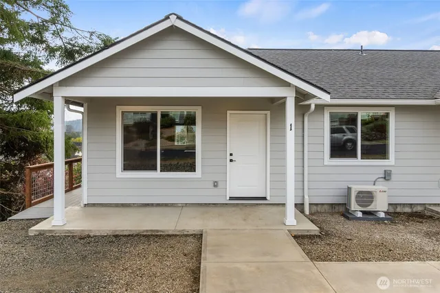 a view of a street with a house