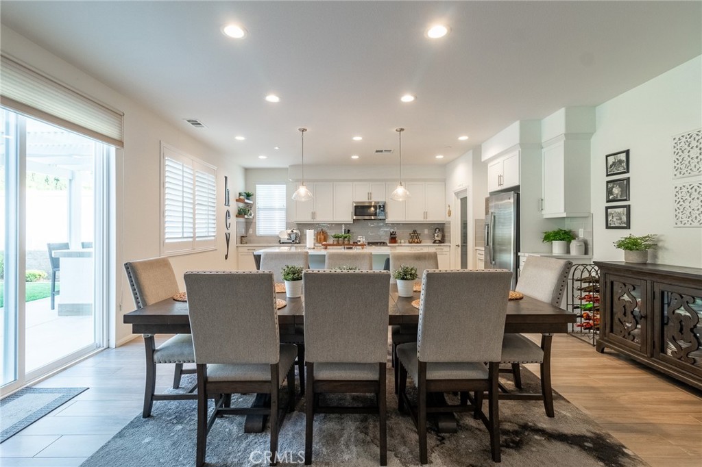 1827 Montecito Lane Redlands, CA 92374 - Photo 11 of 60 a dining room with furniture and window