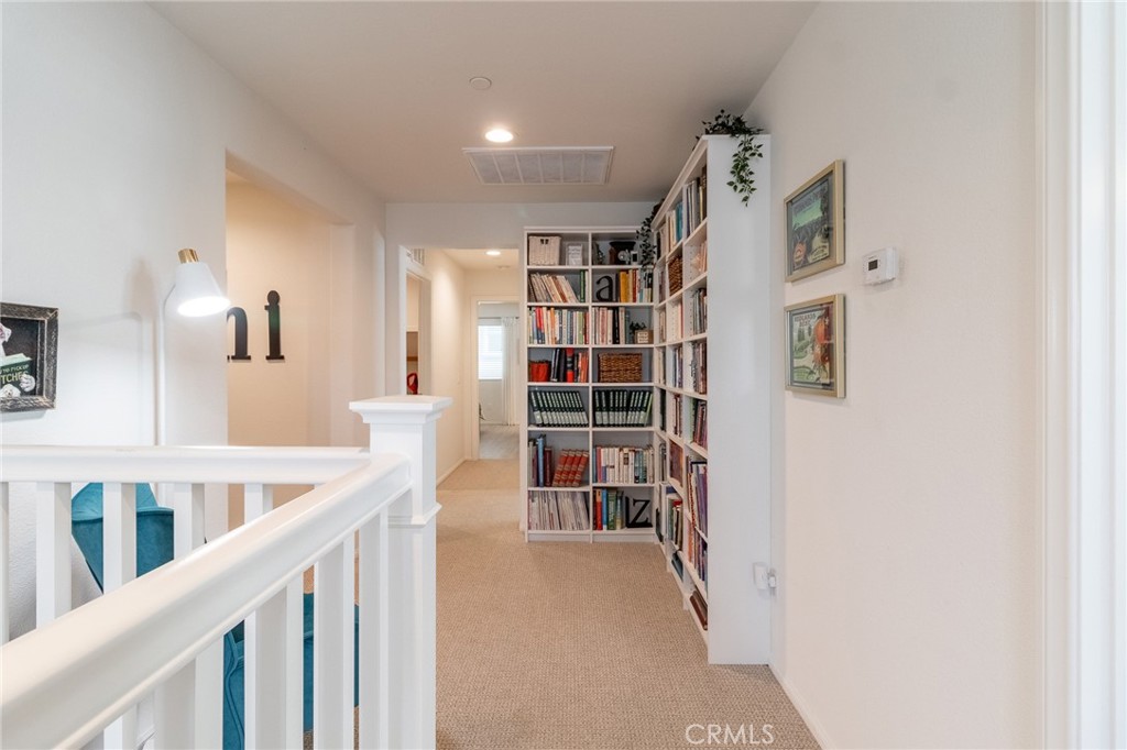 1827 Montecito Lane Redlands, CA 92374 - Photo 24 of 60 a view of a hallway with seating area