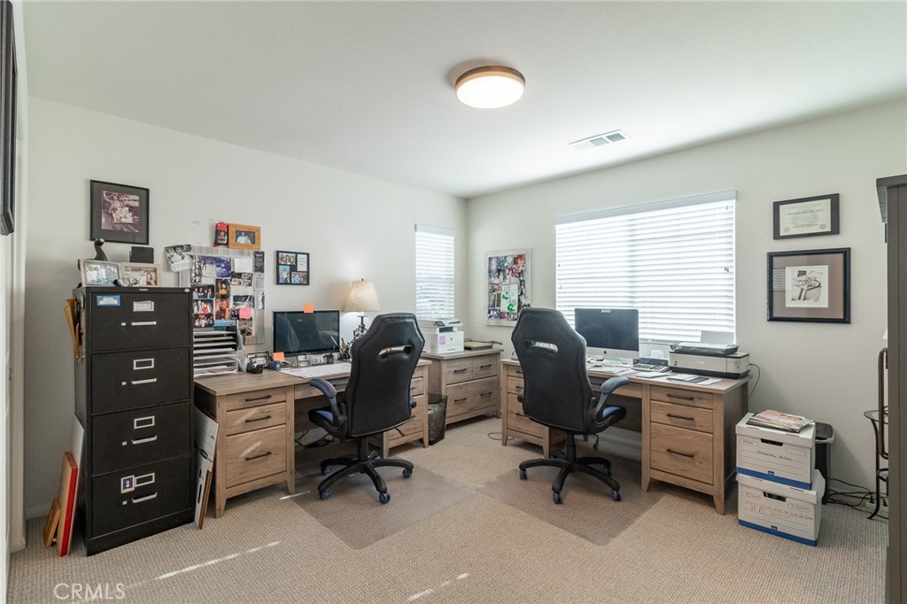 1827 Montecito Lane Redlands, CA 92374 - Photo 30 of 60 a view of a workspace with furniture and a window