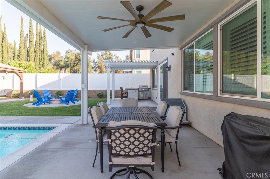 1827 Montecito Lane Redlands, CA 92374 - Photo 55 of 60 a view of a dining room with furniture window and outside view