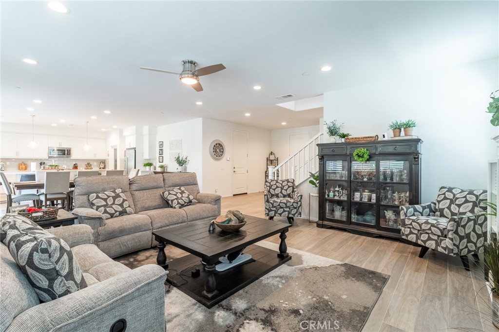 1827 Montecito Lane Redlands, CA 92374 - Photo 8 of 60 a living room with furniture and wooden floor