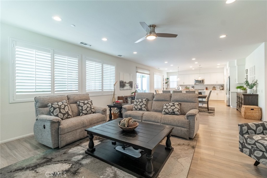 1827 Montecito Lane Redlands, CA 92374 - Photo 10 of 60 a living room with furniture and a large window