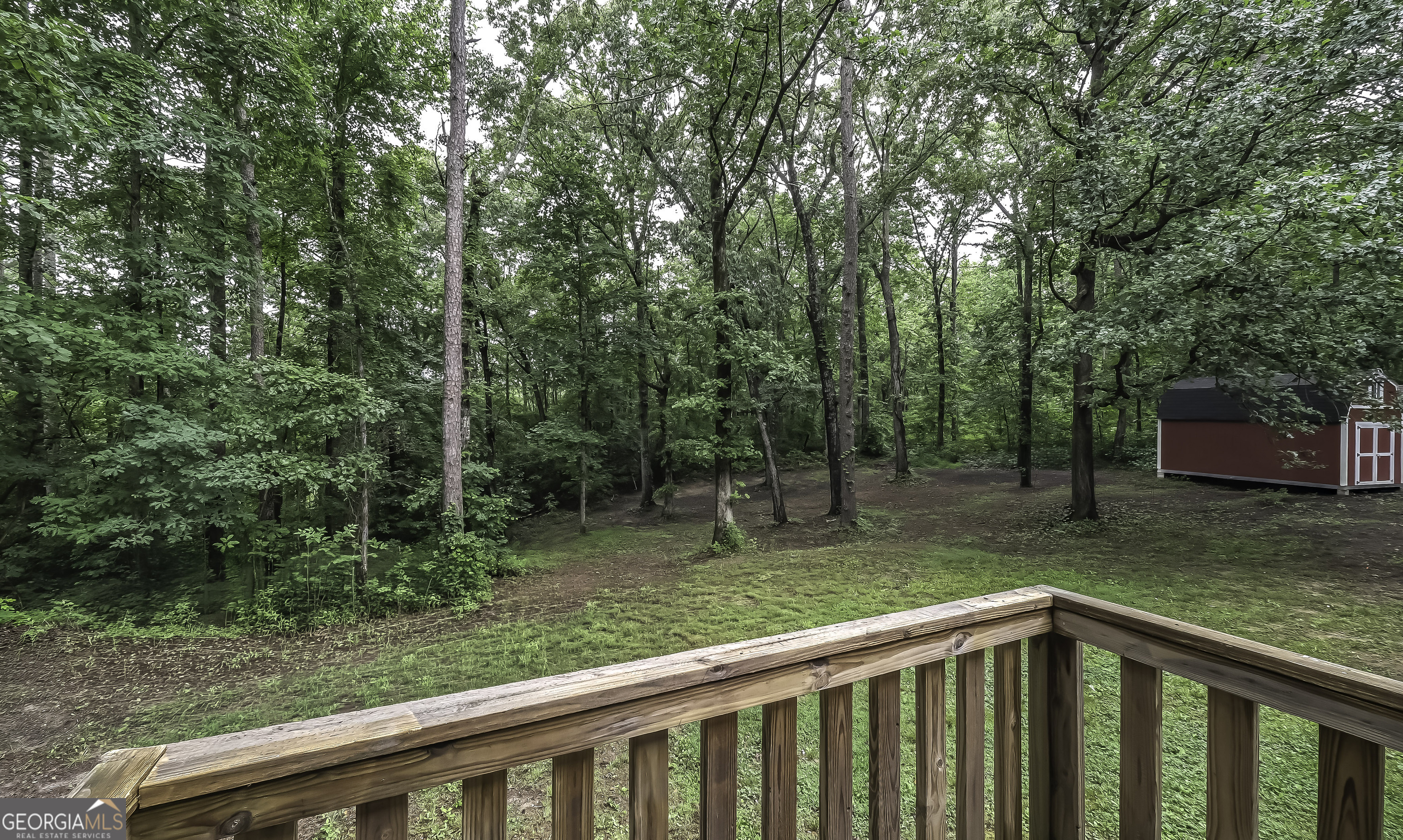 91 Holder Road Temple, GA 30179 - Photo 38 of 40 a view of a wooden deck with a yard
