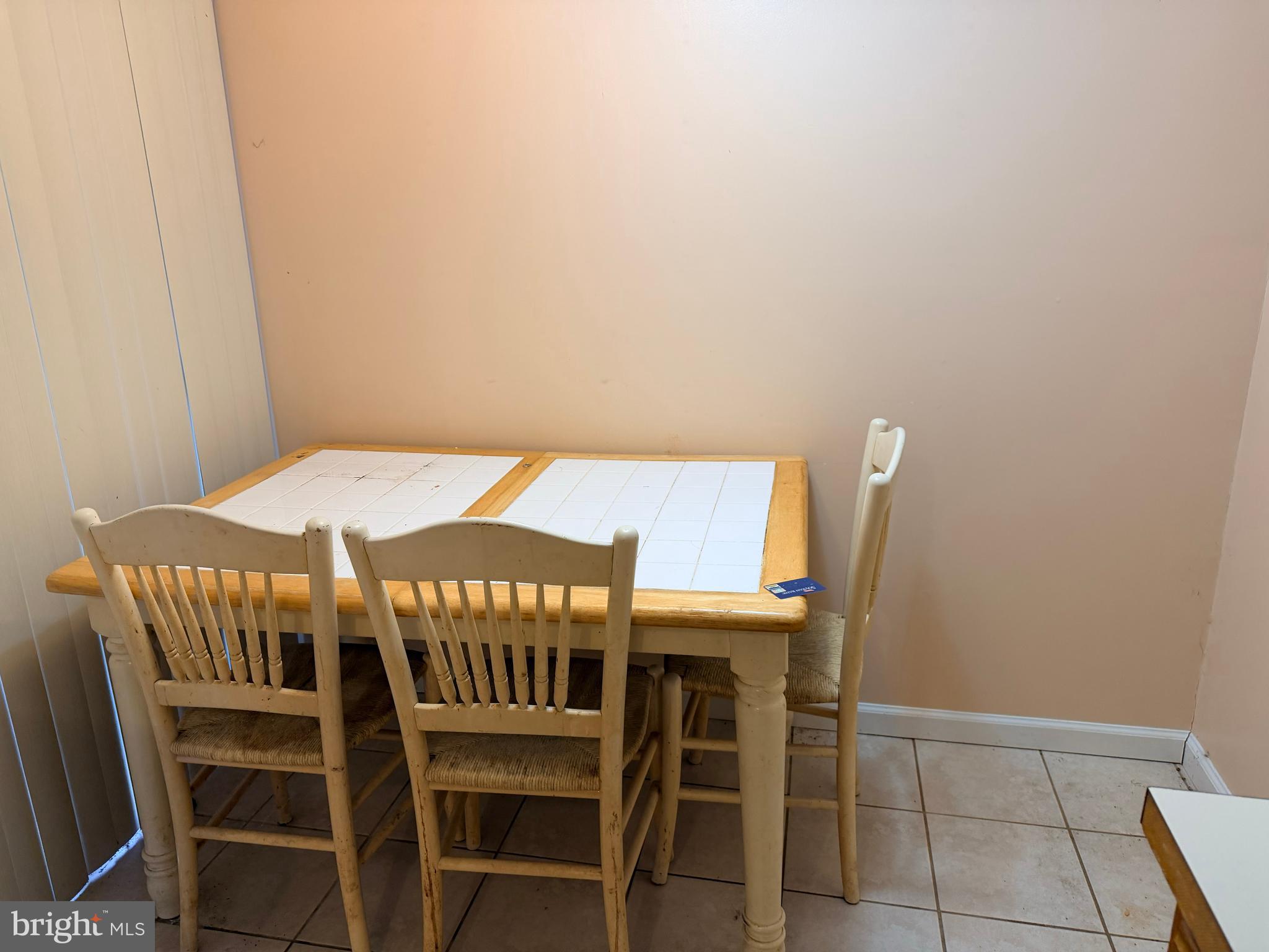 5247 West Running Brook Road, Unit 102 Columbia, MD 21044 - Photo 12 of 28 a view of a dining room with furniture