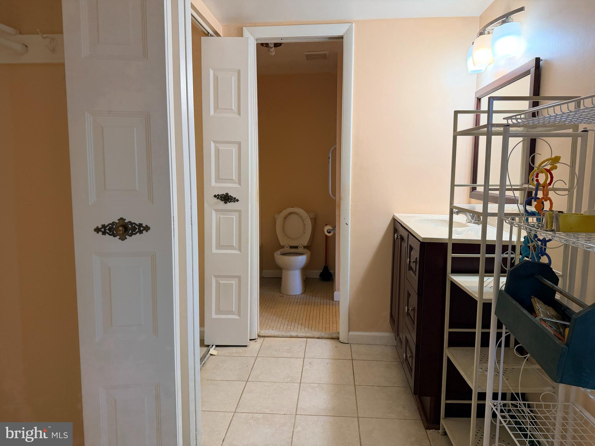 5247 West Running Brook Road, Unit 102 Columbia, MD 21044 - Photo 18 of 28 a bathroom with a shower