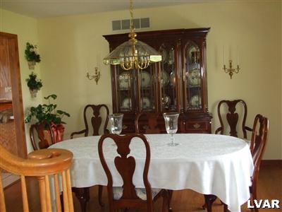 181 Nolf Road Nazareth, PA 18064 - Photo 5 of 19 a dining room with furniture and potted plants