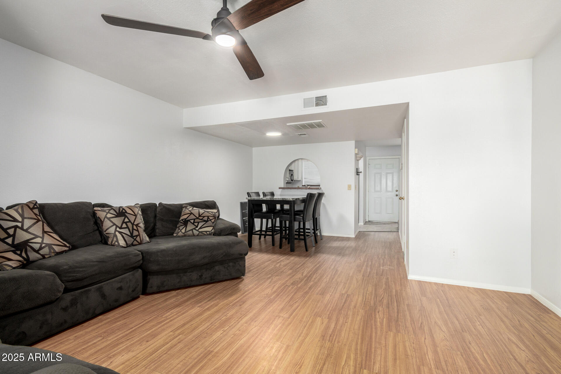 622 West 14th Street Tempe, AZ 85281 - Photo 2 of 18 a living room with furniture and a wooden floor