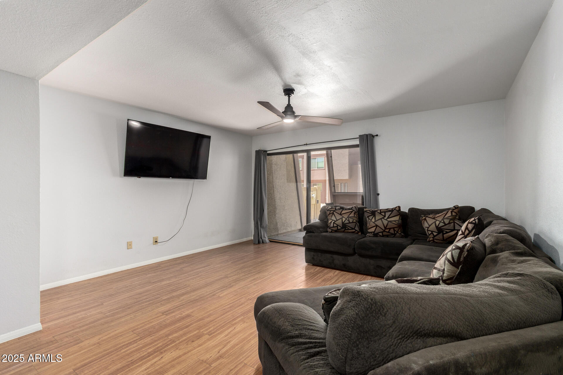622 West 14th Street Tempe, AZ 85281 - Photo 3 of 18 a living room with furniture and a flat screen tv