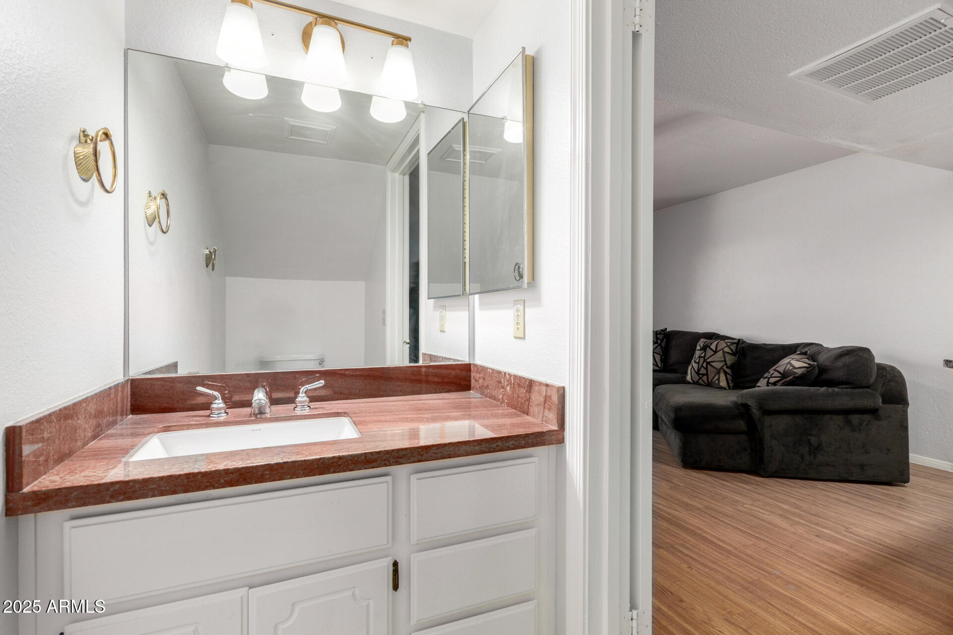 622 West 14th Street Tempe, AZ 85281 - Photo 6 of 18 a en suite bathroom with a granite countertop sink a mirror and a shower