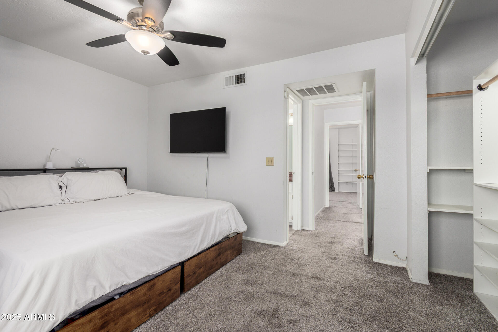 622 West 14th Street Tempe, AZ 85281 - Photo 8 of 18 a bedroom with a bed and a flat screen tv