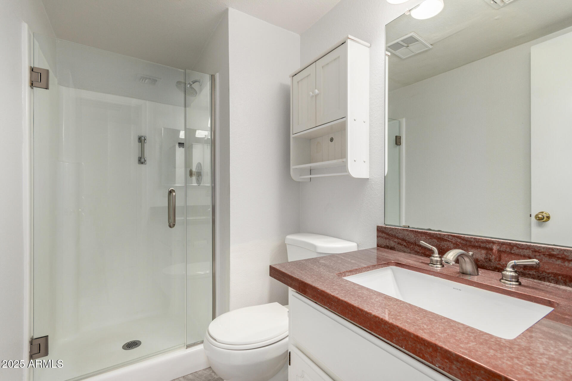 622 West 14th Street Tempe, AZ 85281 - Photo 9 of 18 a bathroom with a sink toilet and shower