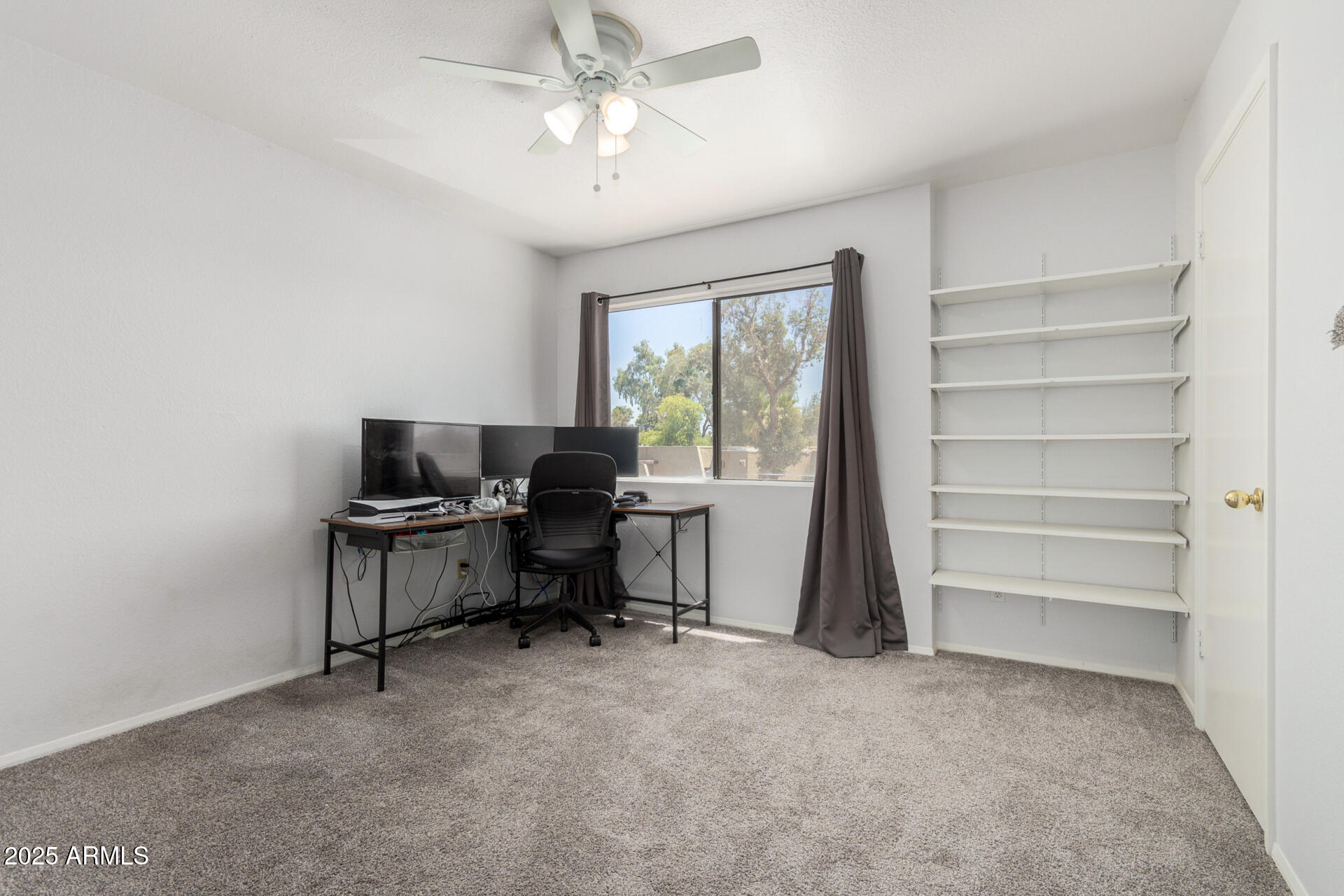 622 West 14th Street Tempe, AZ 85281 - Photo 10 of 18 a view of a workspace with furniture and a window