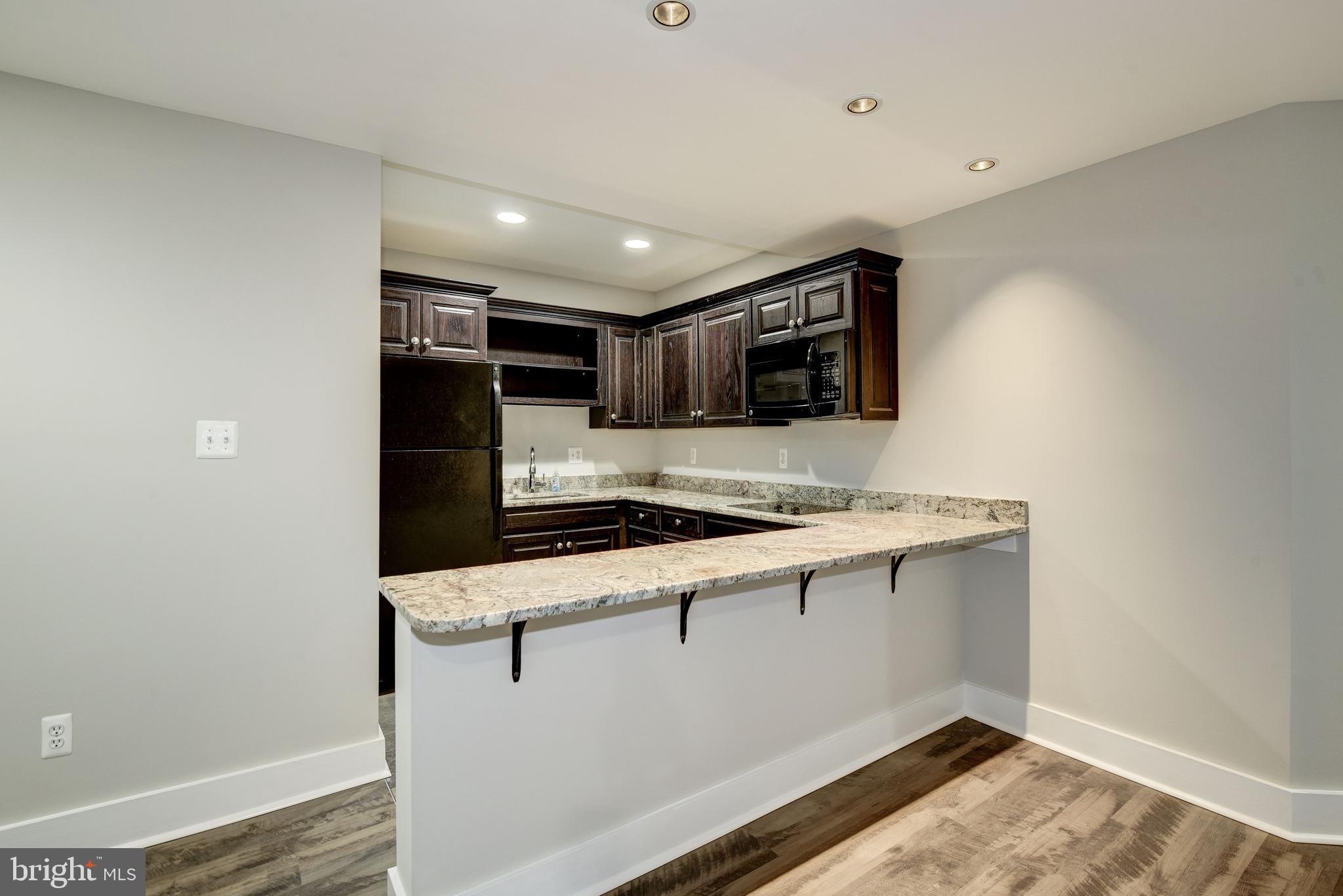 15818 Laughlin Lane Silver Spring, MD 20906 - Photo 41 of 60 Lower level kitchen