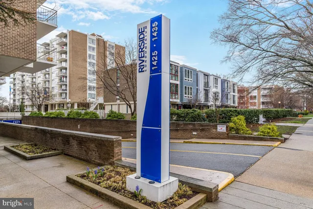 a city street lined with tall buildings