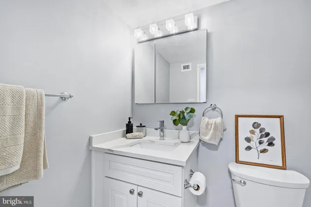 a workspace with furniture and a window