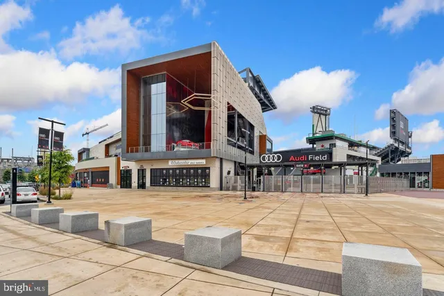 a view of a patio with a yard