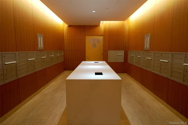 a view of a bathroom with a sink and mirror